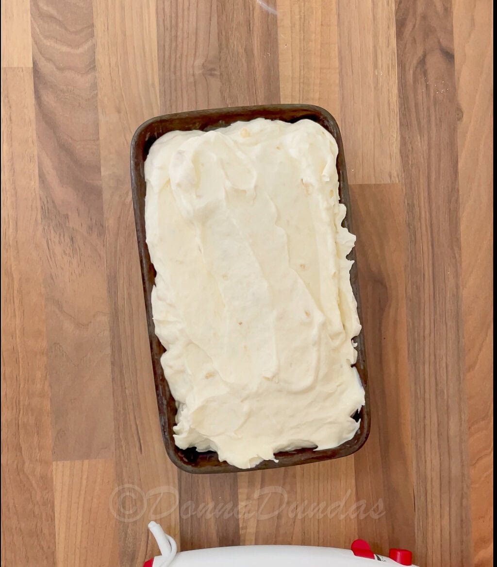 banoffee ice cream mixture in loaf tin.