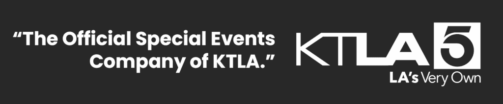 Brightly lit carnival rides and games at an event in Los Angeles. Perfect for festivals, private par.