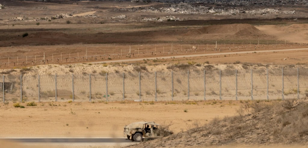 Border photo by Amir Levy/Getty Image
