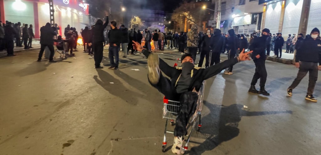 Iranians gather while blocking a street during a protest in Kermanshah, Iran on January 8, 2026. Photo by Kamran/Middle East Images/AFP via Getty Images.