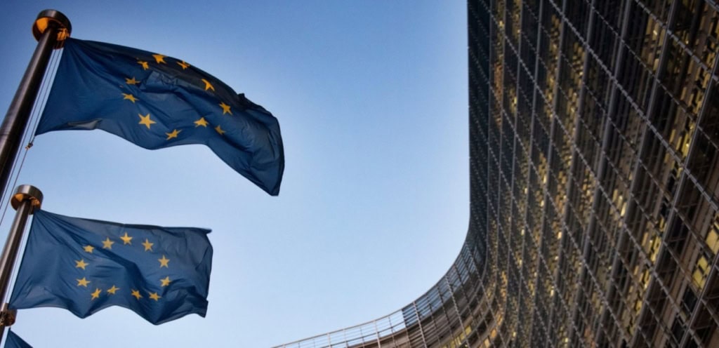 European flags wave in front of the European Commission (EC) headquarters in Brussels, Belgium. Photo by Michele Spatari/NurPhoto