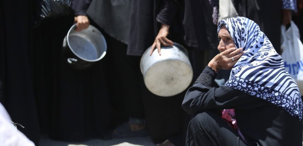 Organizations distribute food to Palestinians at Nusierat Refugee Camp in Gaza City, Gaza on June 26, 2025. Photo by Hassan Jedi/Anadolu via Getty Images.