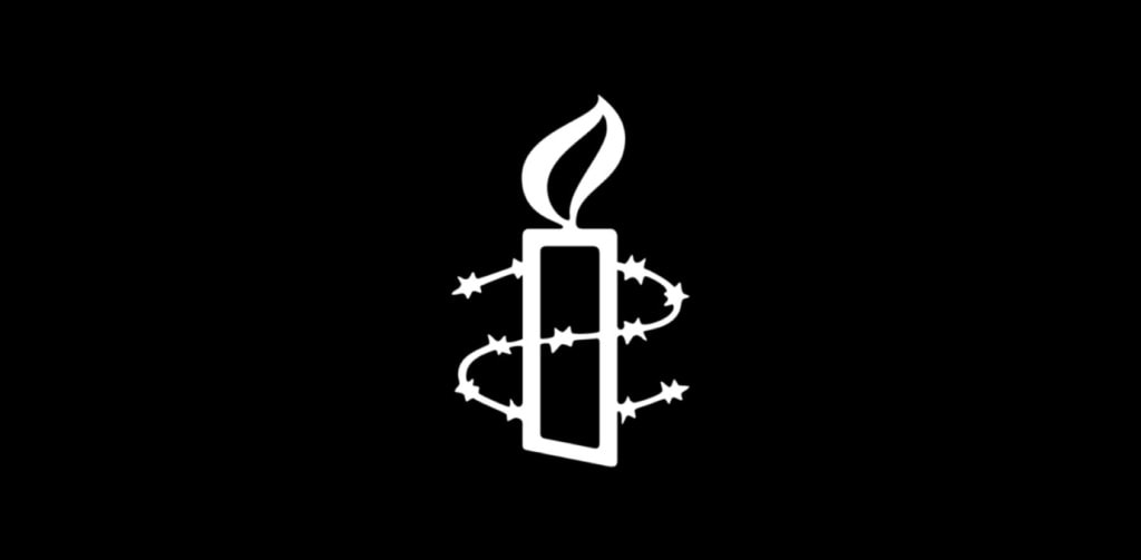 Amnesty logo white candle on black