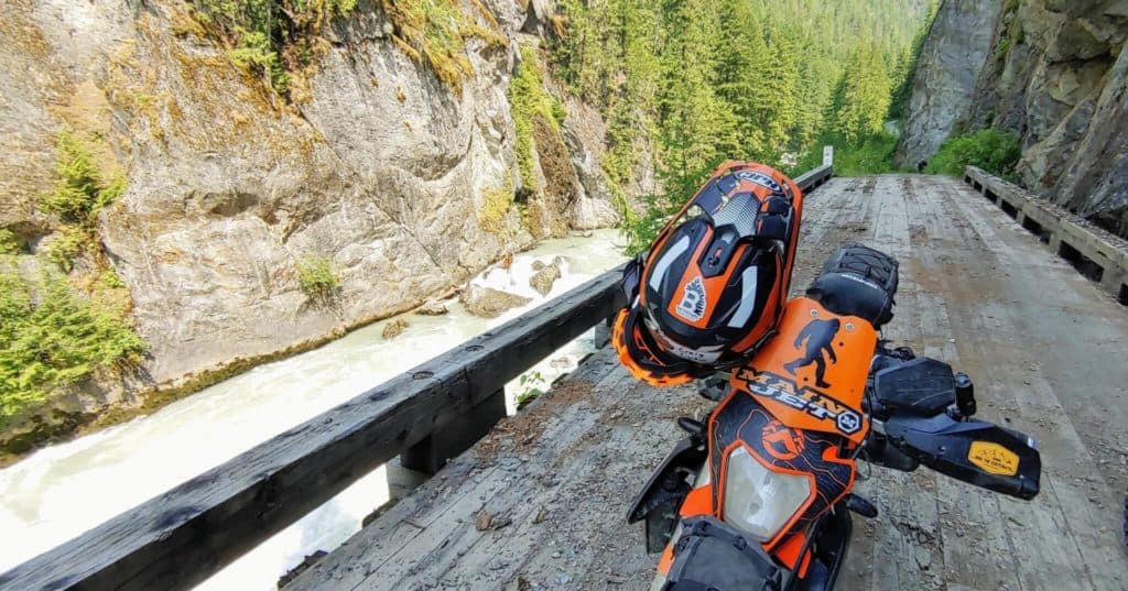 motorcycle on bridge in canyon