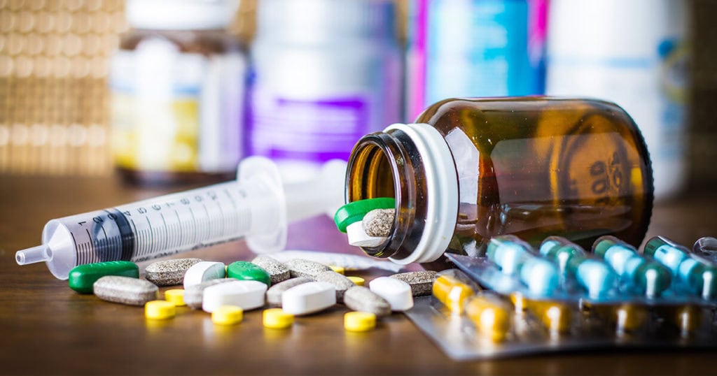 A medicine bottle with pills