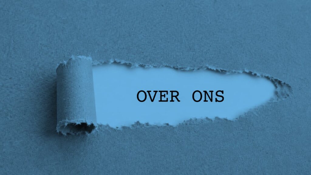 Gescheurd blauw papier waaronder de woorden Over Ons tevoorschijn komen, duidelijk een Over ons-pagina.