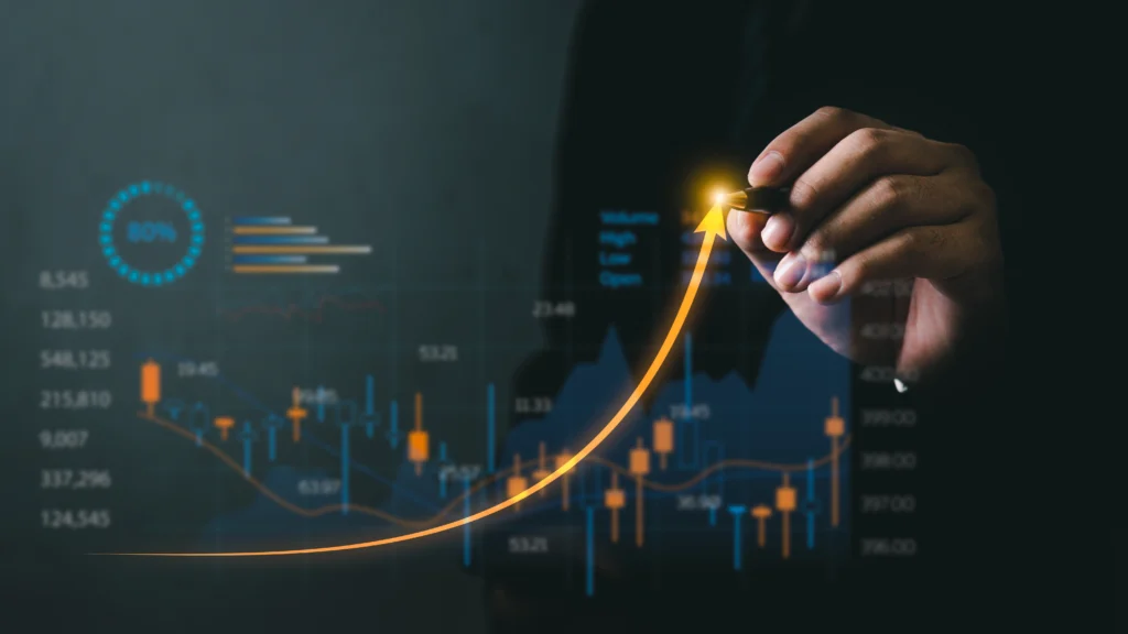 A person is creating a graph on a digital screen, focused on the data being represented