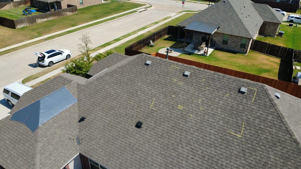 Marked hail test square labeled 9RF with individual hail hits circled in yellow chalk, Krum, TX
