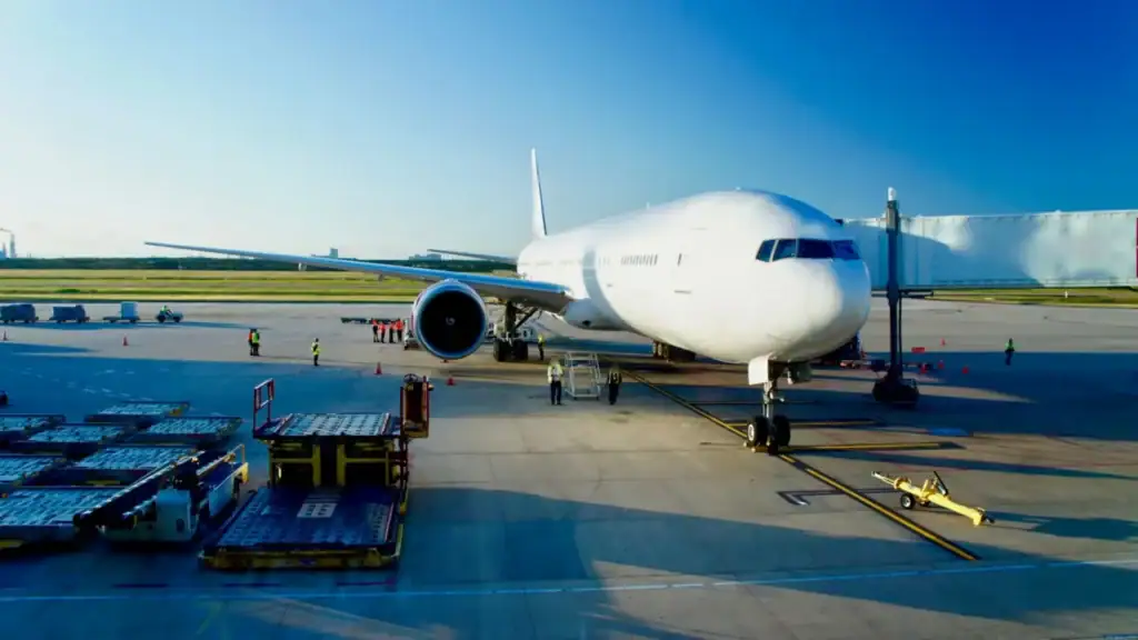 Airplane on airport tarmac preparing for departure