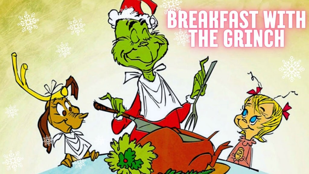A festive Grinch character with breakfast in Eureka Springs during holiday season.