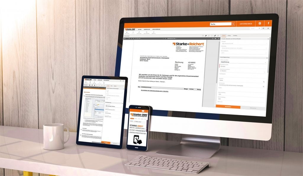 Mobile Geräte am Arbeitsplatz mit Starke-DMS Unterlagen am Bildschirm