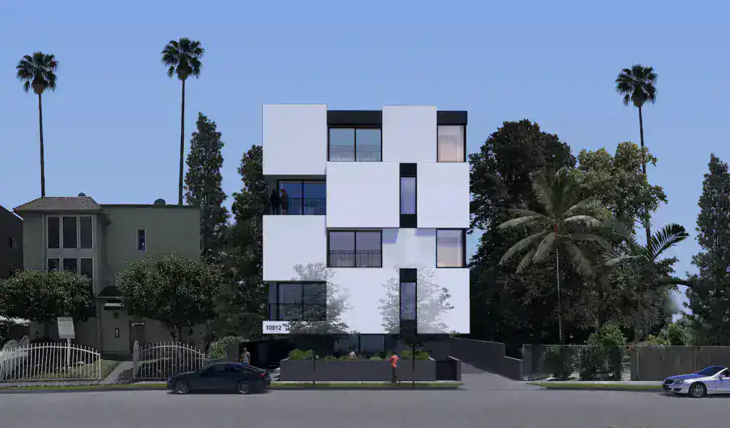 Modern white multi-story building with geometric, box-like volumes and large glass windows.
