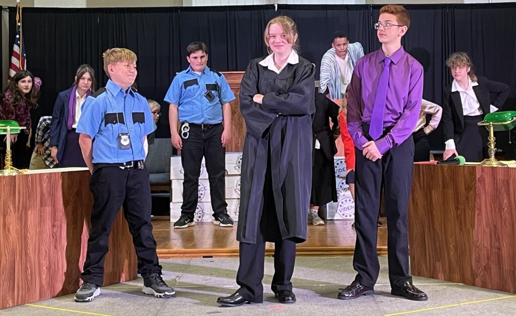 MLS students on stage during Order in the Court