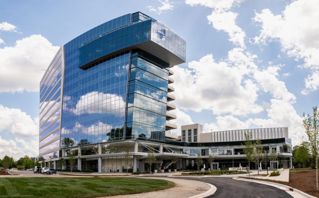 The mirrored exterior of 1000 Social, The Exchange's premier Raleigh office and event space
