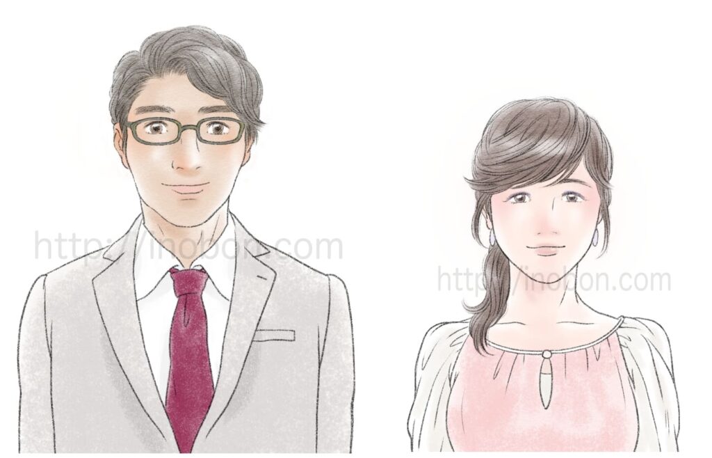 スーツを着た男性とピンクのブラウスの女性