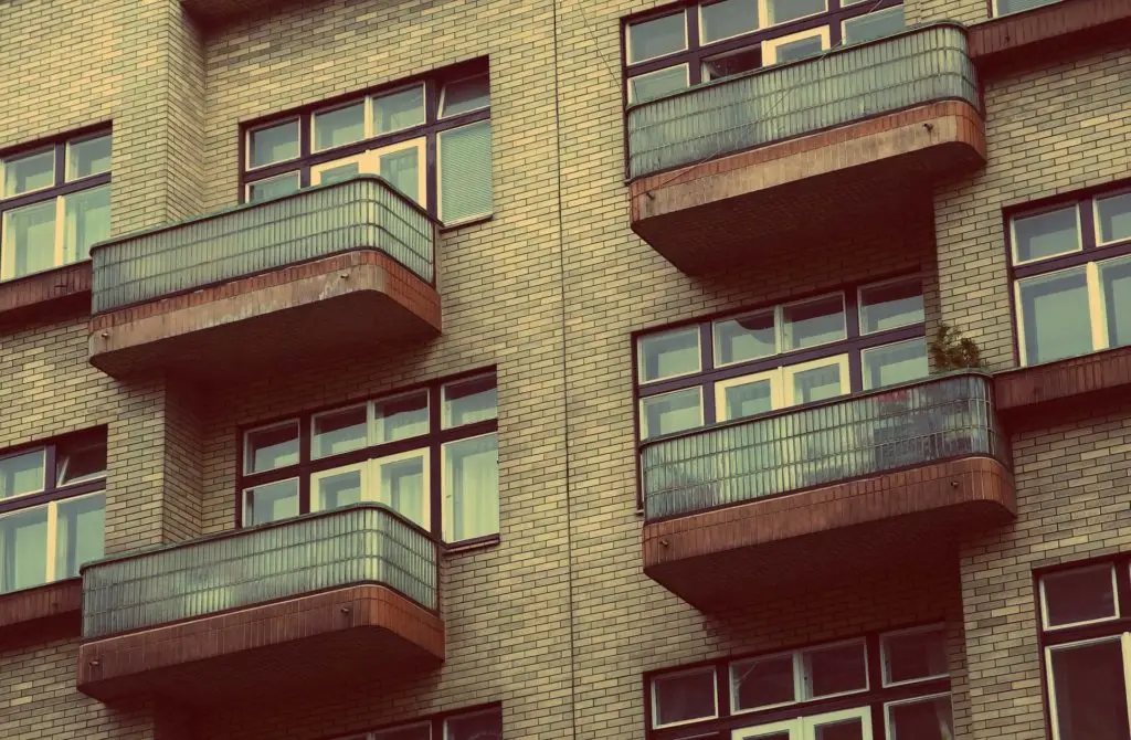balconies on brown stone condominiums to articulate Homeowners Association Expenses