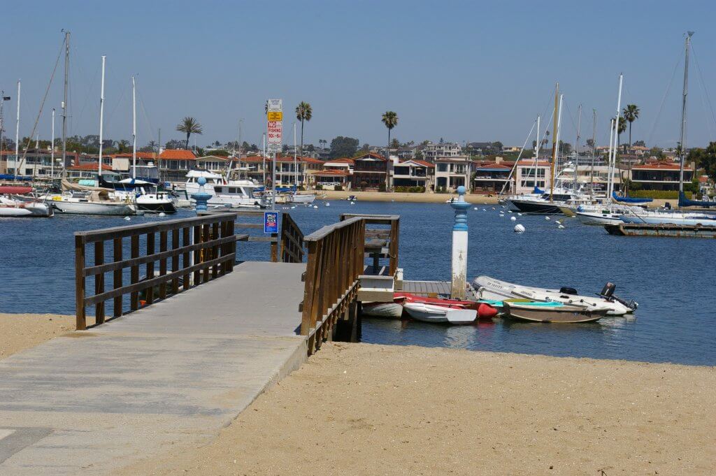 The Deleons claimed the sale of the Well Deserved was notarized near this 15th Street dock at the Newport harbor, after which the Hawkses drove off in their silver CRV. Photo by Caitlin Rother
