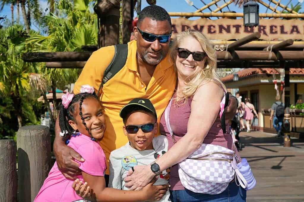 Happy family enjoying a day at Adventureland amusement park.