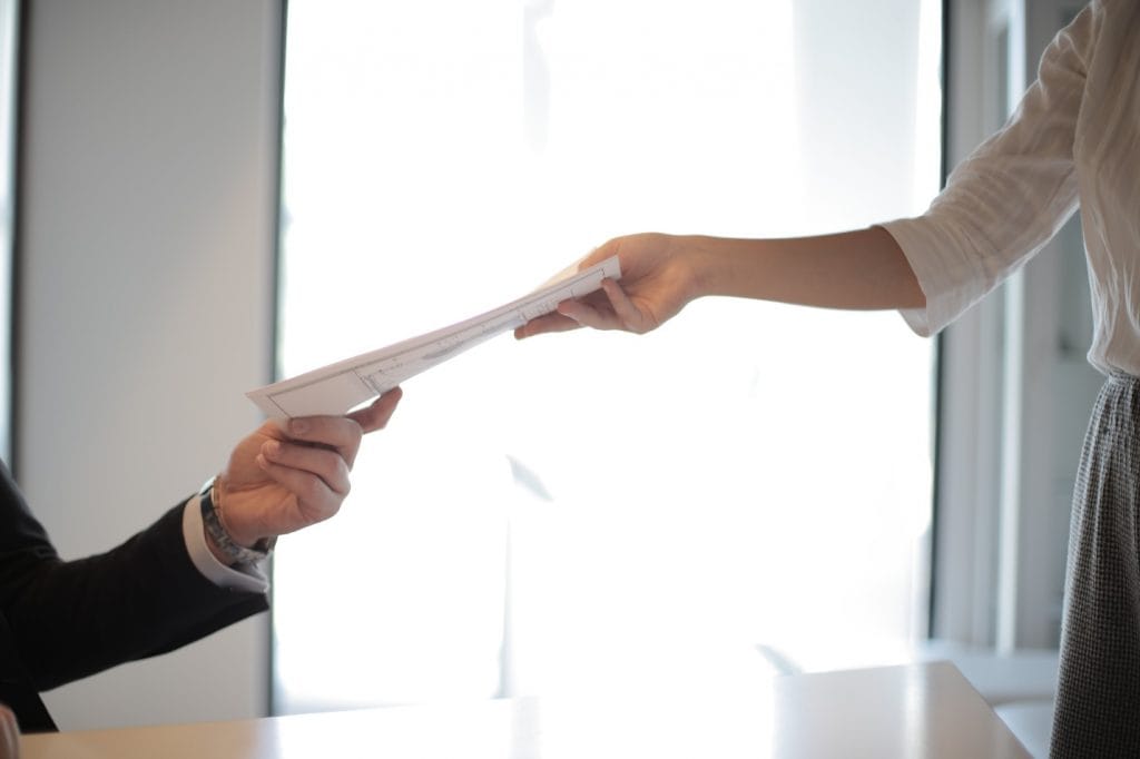 Documents being handed over