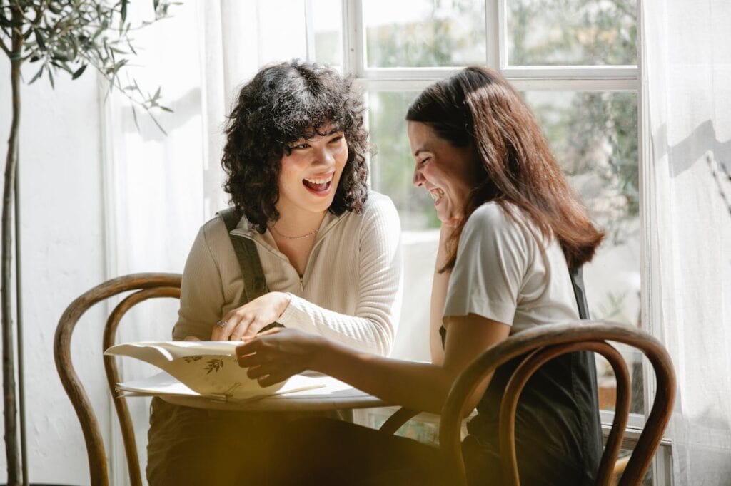 Young Homebuyer Tips - 2 Girls Talking About Paperwork