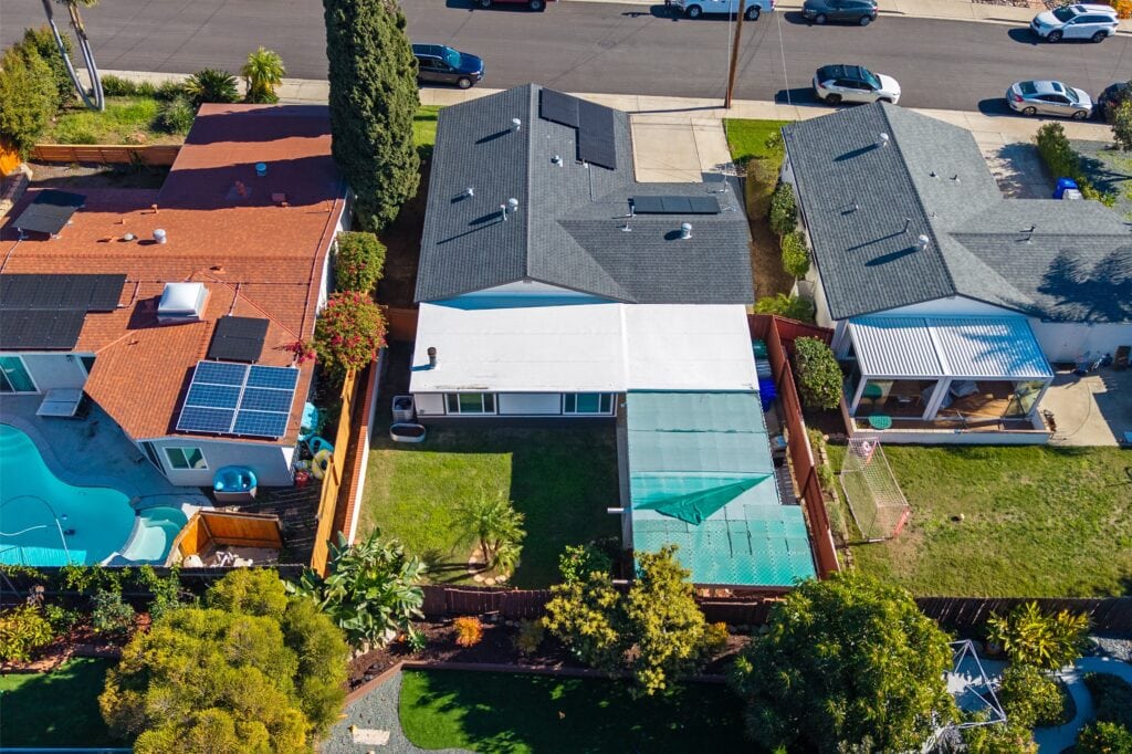 Direct overhead aerial view of 2170 Montclair St in North Park showing the full roofline and fenced backyard.