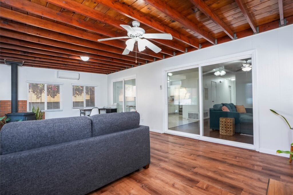 Sun-filled bonus room at 2170 Montclair St North Park with exposed Knotty Pine ceilings