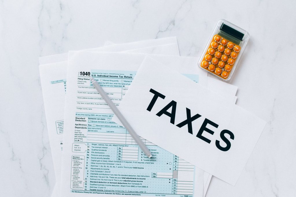 Filling out a tax report, knowing that stealth taxes mean that we pay more than we think