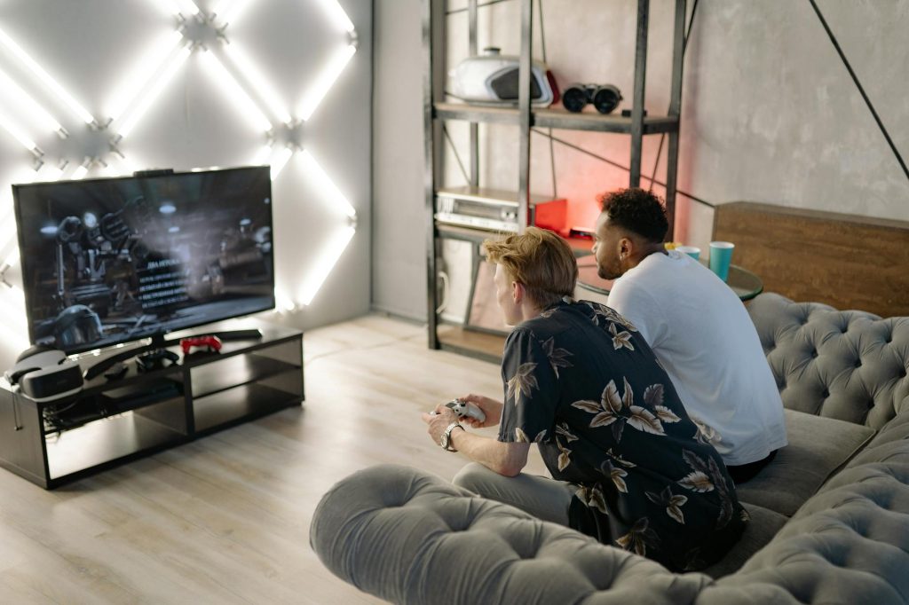 Two men watching television