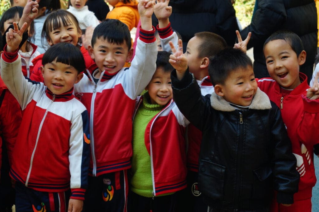 Chinese kindergarten students smiling at the camera Working in China - Kindergarten