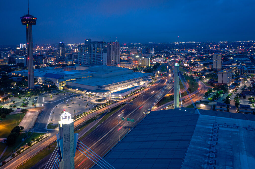 NIOSA 2026: City skyline at night with lights