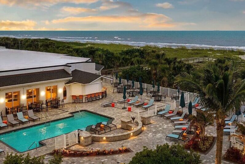 Hilton Cocoa Beach Oceanfront Hotel exterior with beach access and oceanview guest rooms