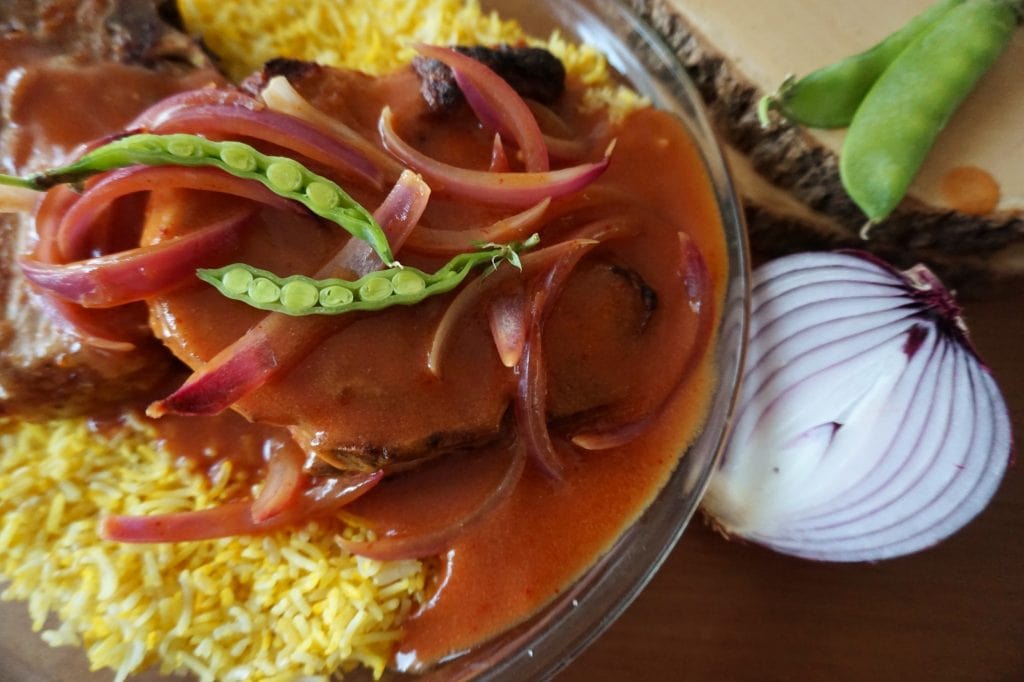 Hong Kong-style Pork Chop on Rice with tomato onion sauce