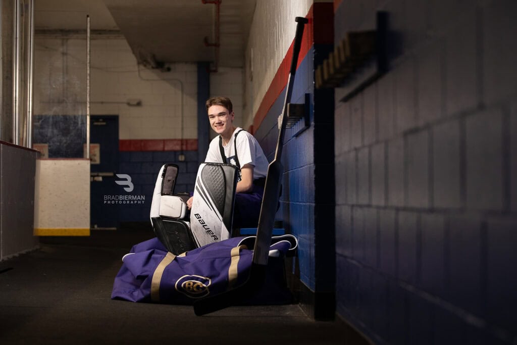 Senior sports portrait of Logan Torrence, hockey goalie for CBC High School in St. Louis, Missouri
