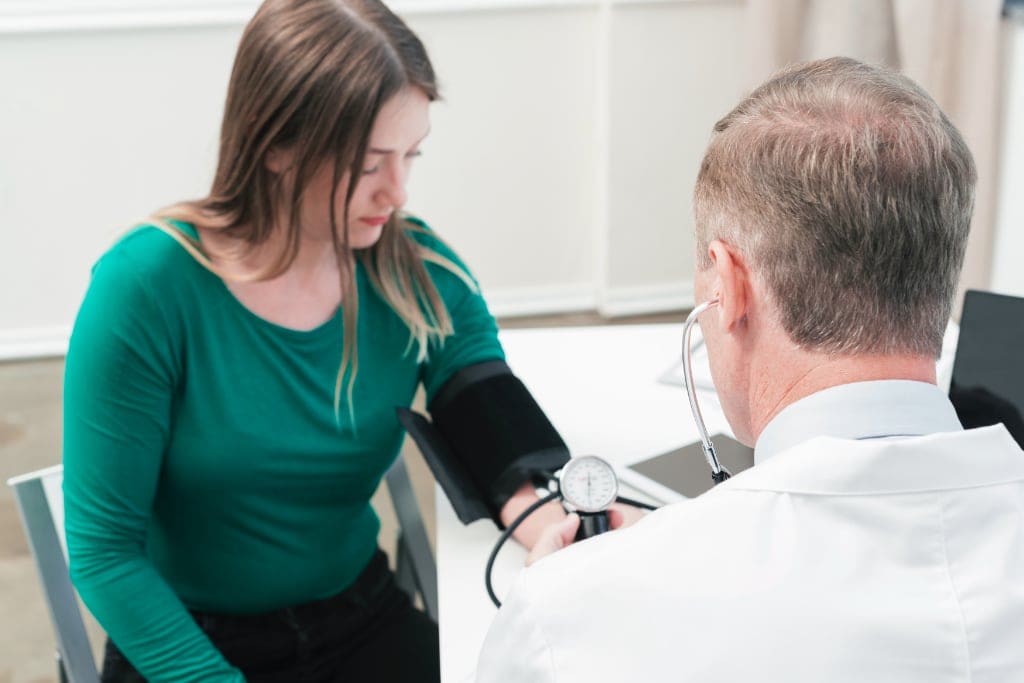 Vitamin B12 Infusion Therapy 9 doctor-tending-patient