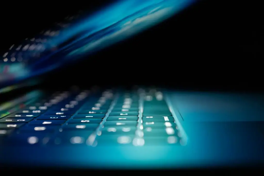 Laptop with illuminated keyboard — electronic signing of cross-border contracts in Ukraine
