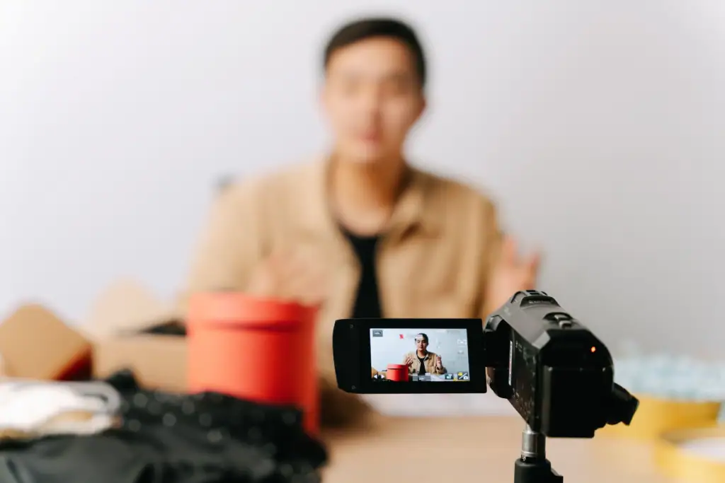 Startup founder filming social media content for their brand launch