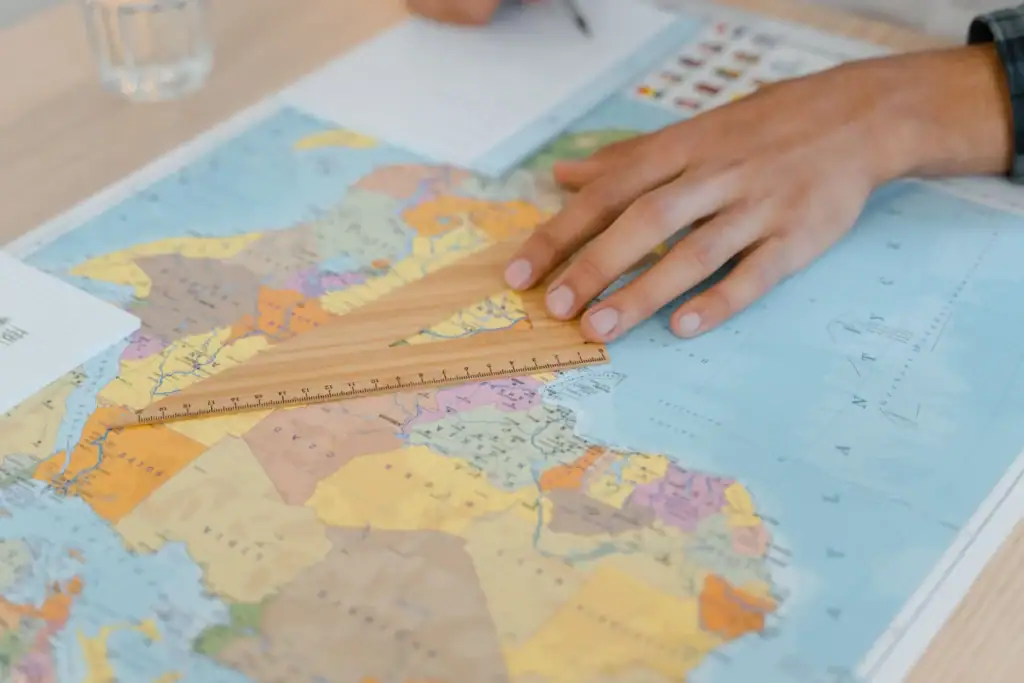 lt: "A-level geography student revising maps and statistics
