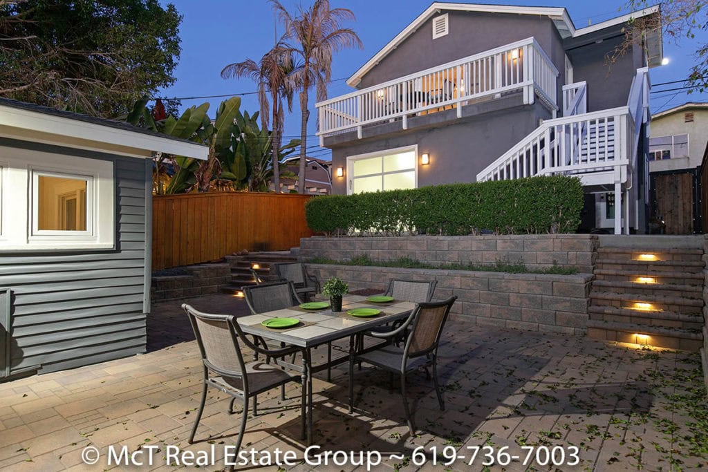 outdoor dining table and chairs with views of guest suite