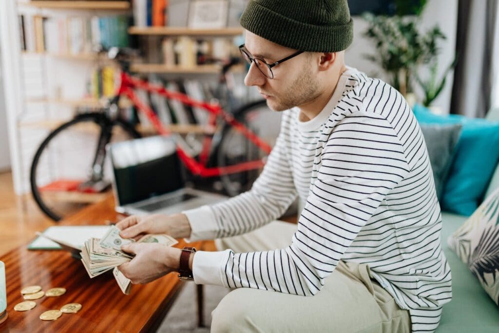 Fed Tax Return Article - A Man Counting His Money