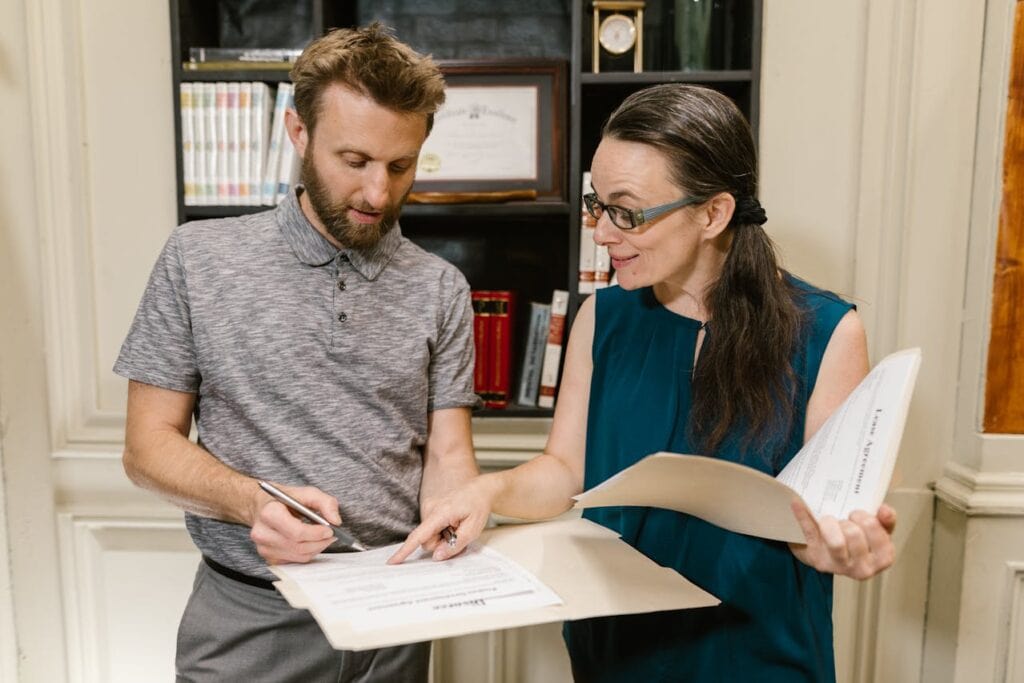 A Man and a Woman Discussing Contracts