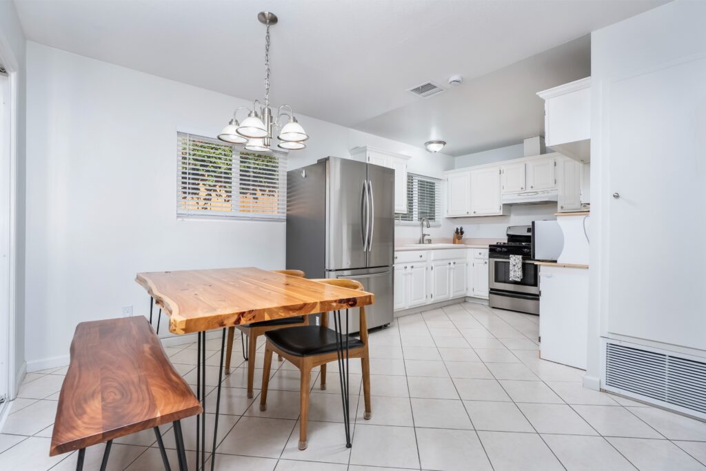 Close-up of the kitchen workspace at 2170 Montclair St in North Park highlighting updated appliances and ample counter space.