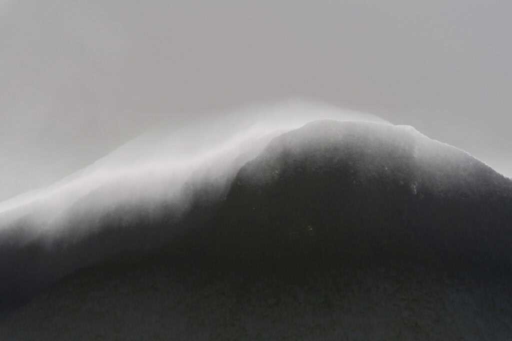 Snow on the tops - Long Sound Fiordland NZ. B&W