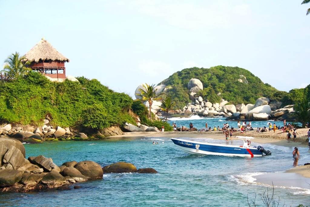 Parque Tayrona, Colombia: an idyllic beach tucked into the jungle. You have to walk 2 hours to get there, but it's SO worth it! Read more in our guide to Parque Tayrona.