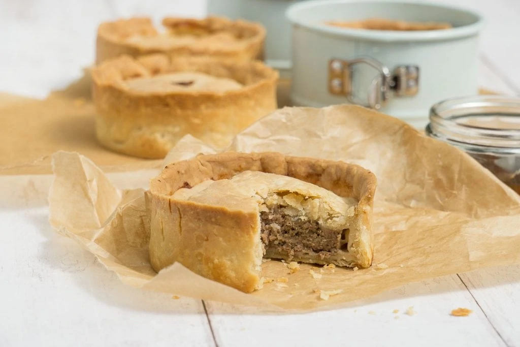 https://sp-ao.shortpixel.ai/client/to_webp,q_glossy,ret_img,w_1024,h_683/https://scottishscran.com/wp-content/uploads/2020/06/Scotch-Pies-Recipe-122-1024x683.jpg