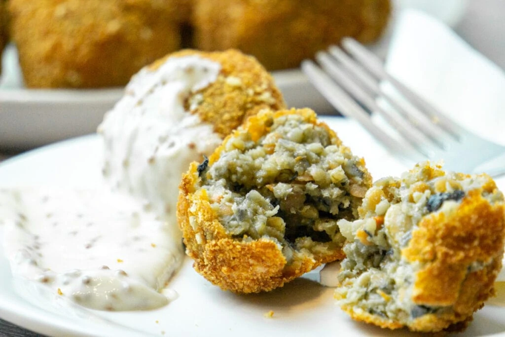 Haggis Bon Bons Recipe - Haggis Balls on a plate with whisky dipping sauce
