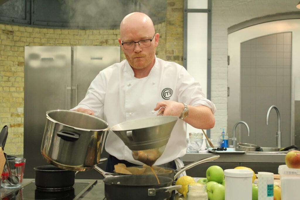 Gary Maclean - Scotland's National Chef and Masterchef Professionals winner cooking in the Masterchef kitchen.
