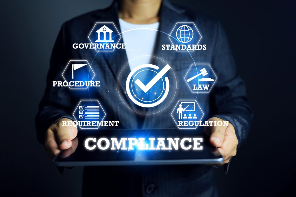 Compliance concept with businessman pointing on compliance to comply the regulation requirement or standard and law for export and import the products for destination market