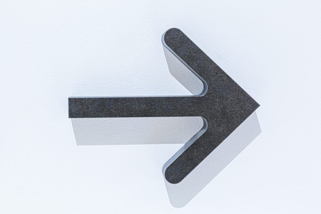 Arrow wayfinding sign