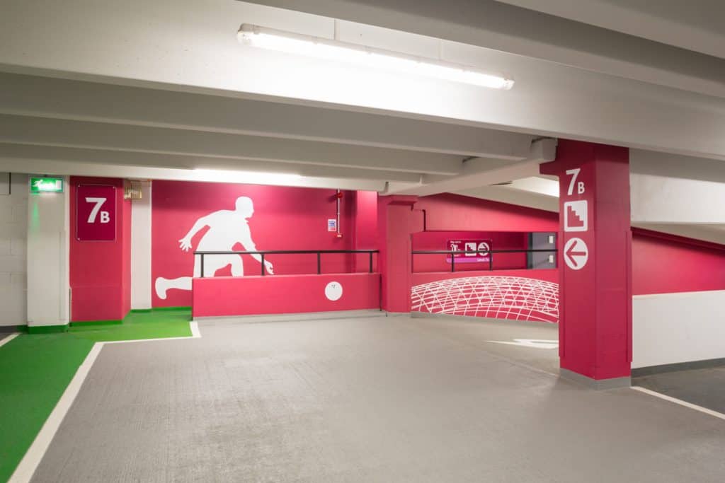 Graffiti style graphic of a a man bowling on the wall of Boar Lane Car Park in Leeds