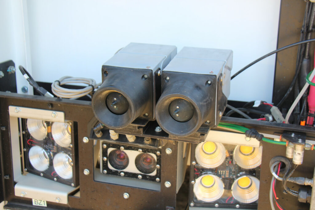 Verdant Robotics, an American manufacturer, is noteworthy for its innovative approach to weed control. Their mounted Sharpshooter spot sprayer utilizes freely moving spheres with tiny openings, instead of traditional spray nozzles, to deliver targeted herbicide applications directly to plants. Additionally, the company is developing a mounted laser weeder, though specific details about this project have not been disclosed.